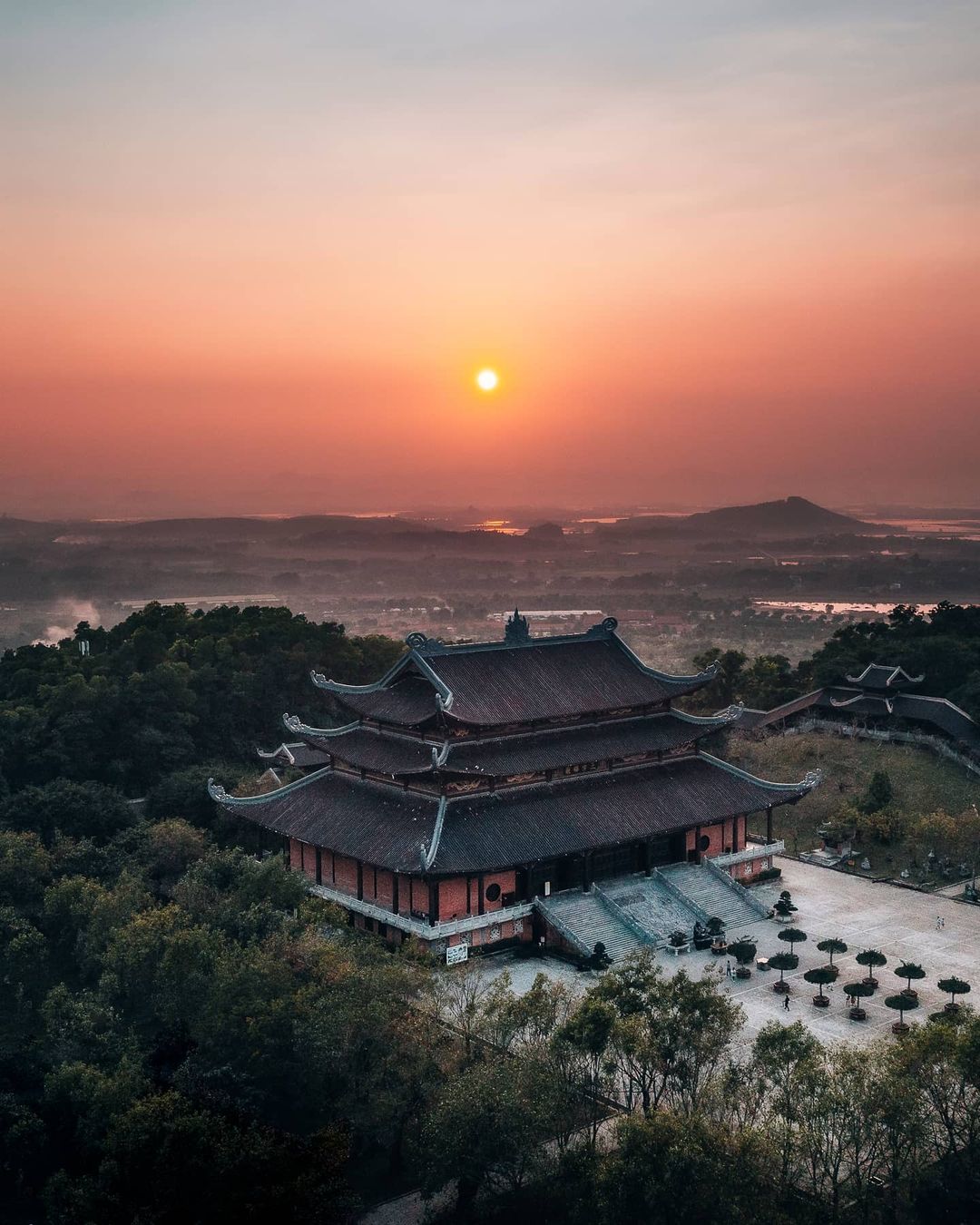 Sunrise over Bai Dinh Great Bell Tower
